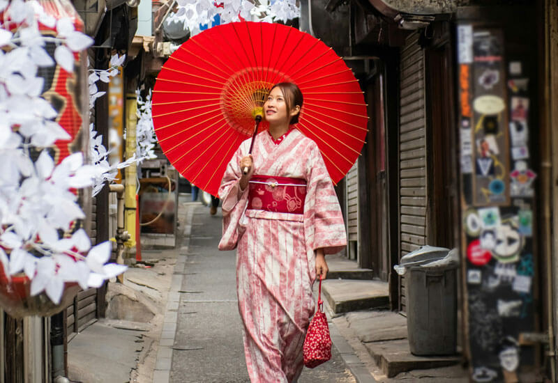 A Woman with Red Umbrella Image