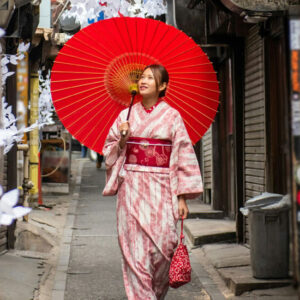 A Woman with Red Umbrella - Image