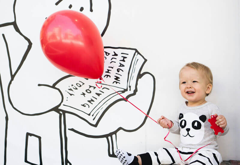 Baby with a Red Balloon Image