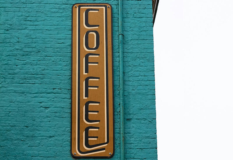 Coffee Signboard on the Wall Image