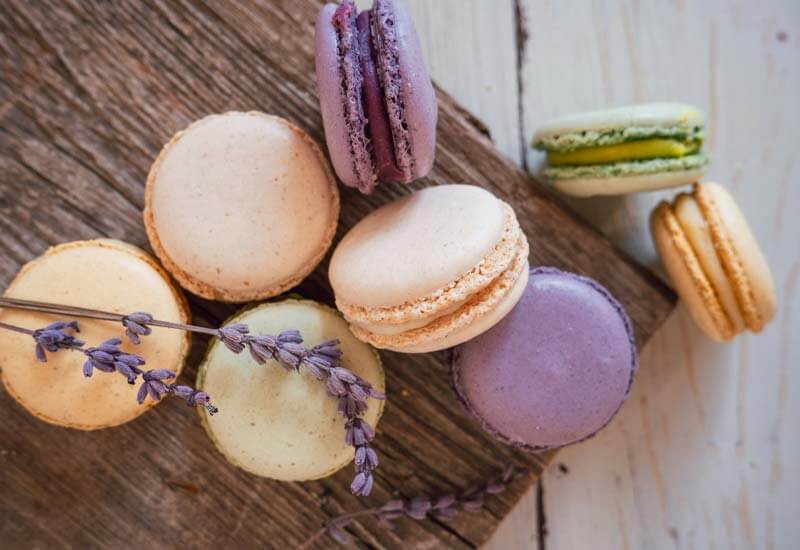 Different types of Macaroons on a board Image