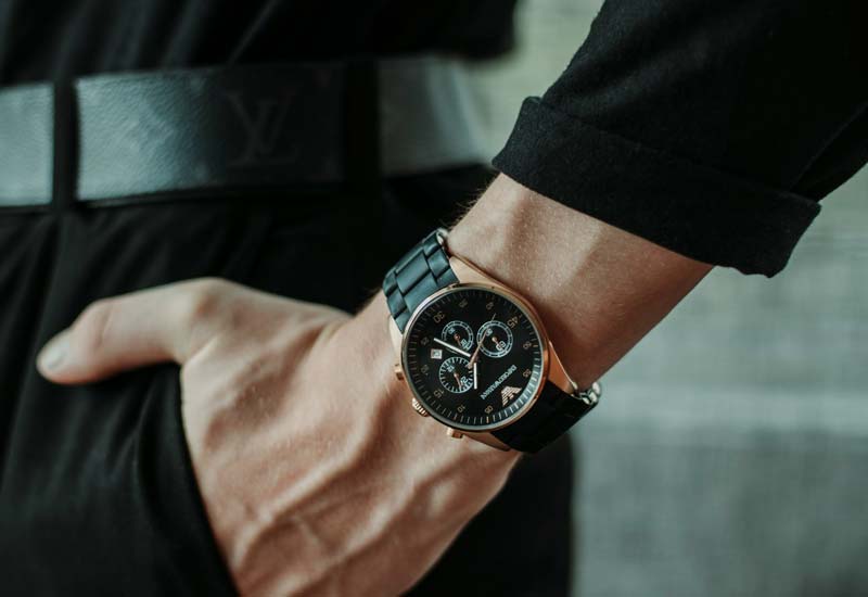 Man in Black with a Wristwatch Image