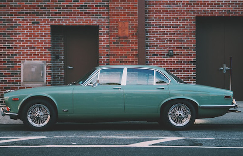 Retro Car near Brick Wall Image