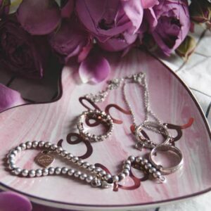 Silver Jewelry on the plate - Image