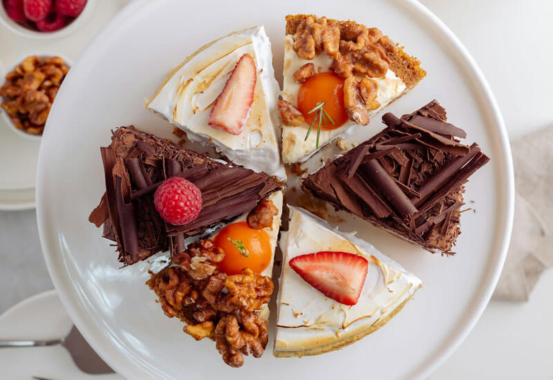 Slices of Different Flavored Cakes Image