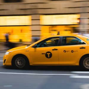 Yellow Taxi Out in Town - Image